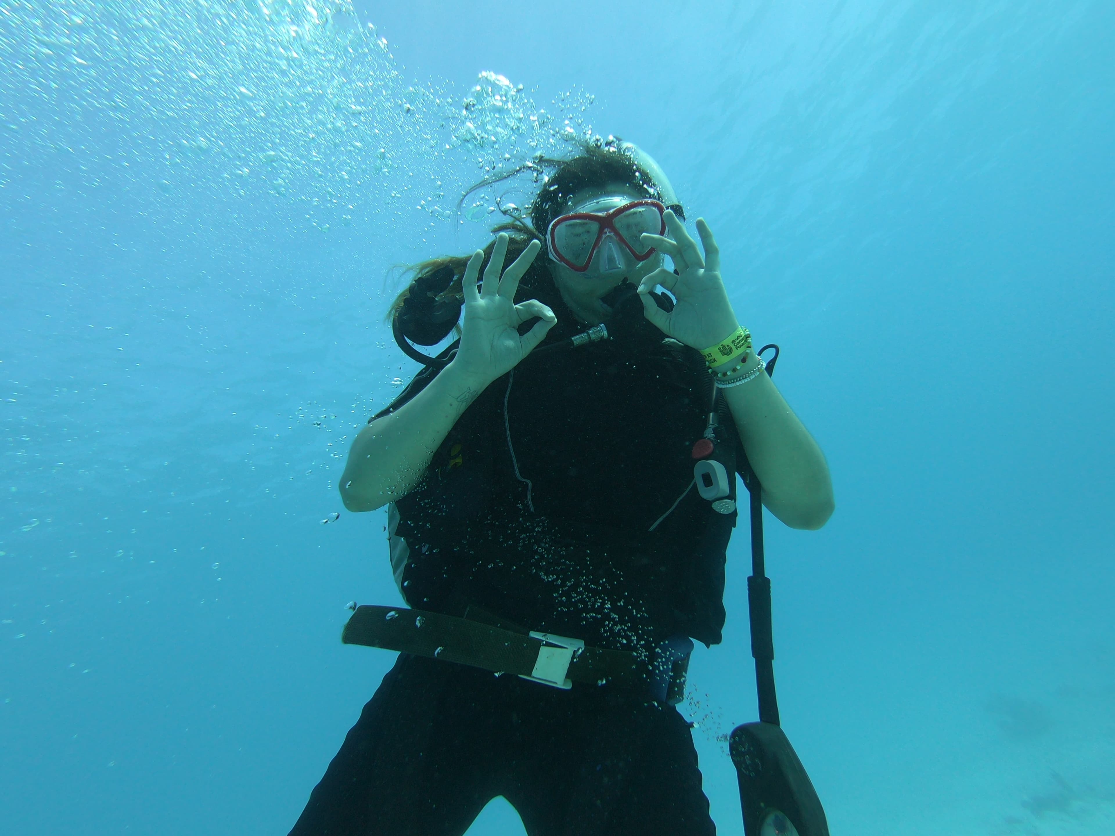 Beginner diver over a shallow reef